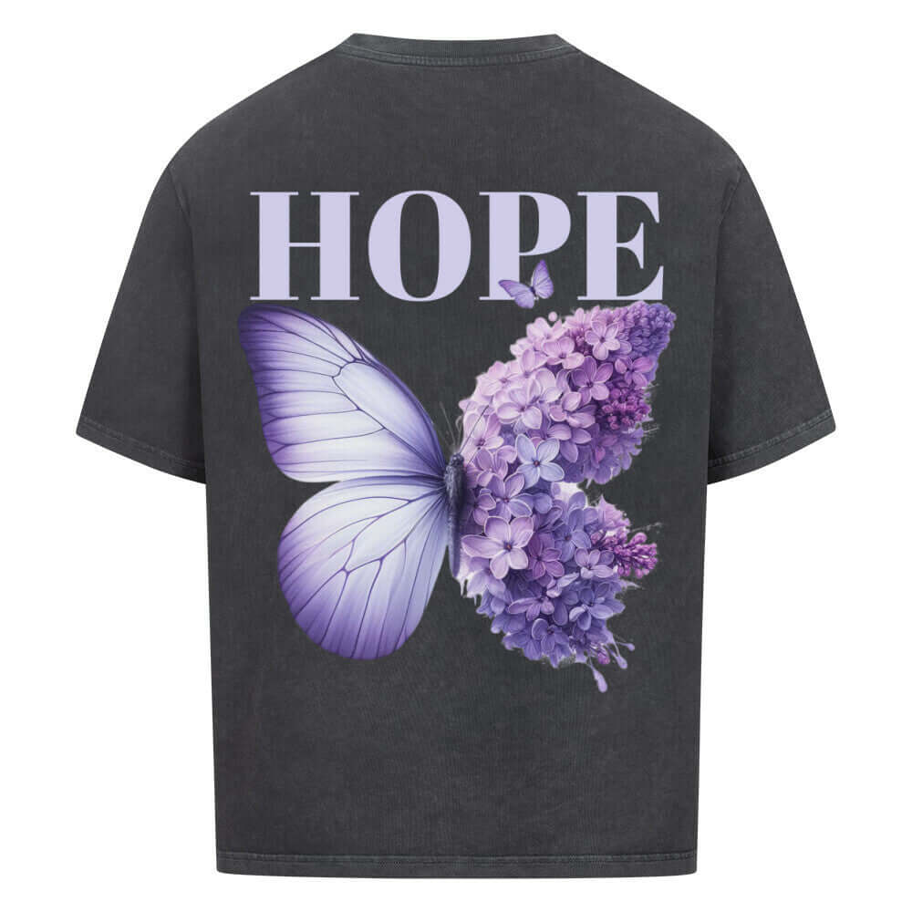 An oversized t-shirt featuring a beautifully designed butterfly with the word "Hope" elegantly printed on the back. The tshirt offers a relaxed fit, soft fabric, and an uplifting design, perfect for a cozy and inspiring look.