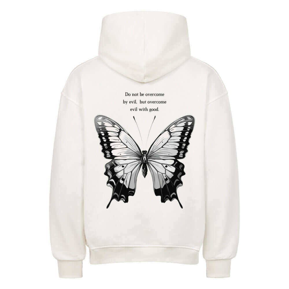 An oversized hoodie featuring a delicate butterfly design with a motivational Bible verse printed on the back. The hoodie has a relaxed fit, soft fabric, and an inspiring, stylish design, perfect for comfort and sharing positivity.