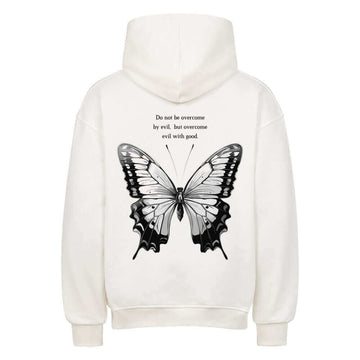 An oversized hoodie featuring a delicate butterfly design with a motivational Bible verse printed on the back. The hoodie has a relaxed fit, soft fabric, and an inspiring, stylish design, perfect for comfort and sharing positivity.