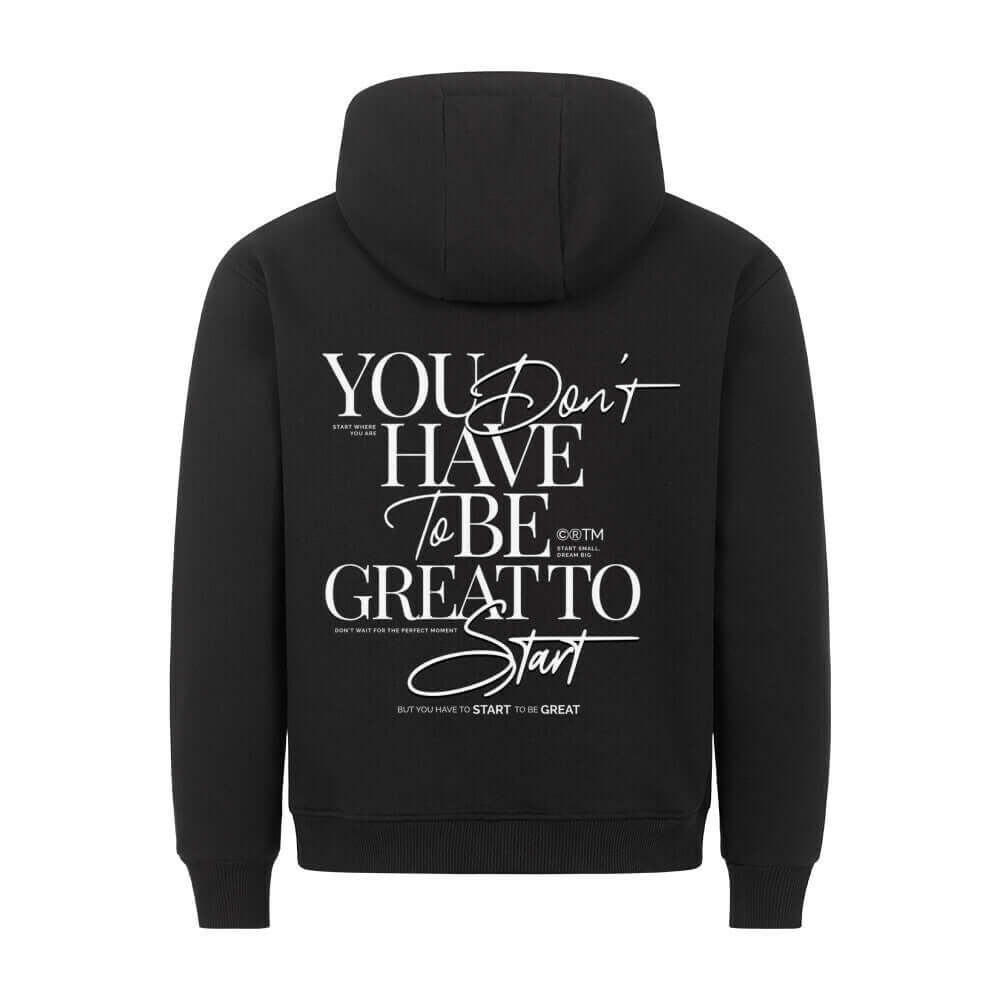 A hoodie featuring the phrase "Be great" printed on the back in bold, modern lettering. The hoodie has a relaxed fit, soft material, and a casual, stylish design, perfect for an inspiring and confident look.